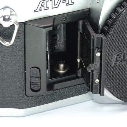 Battery compartment cover replacement for Canon AV-1