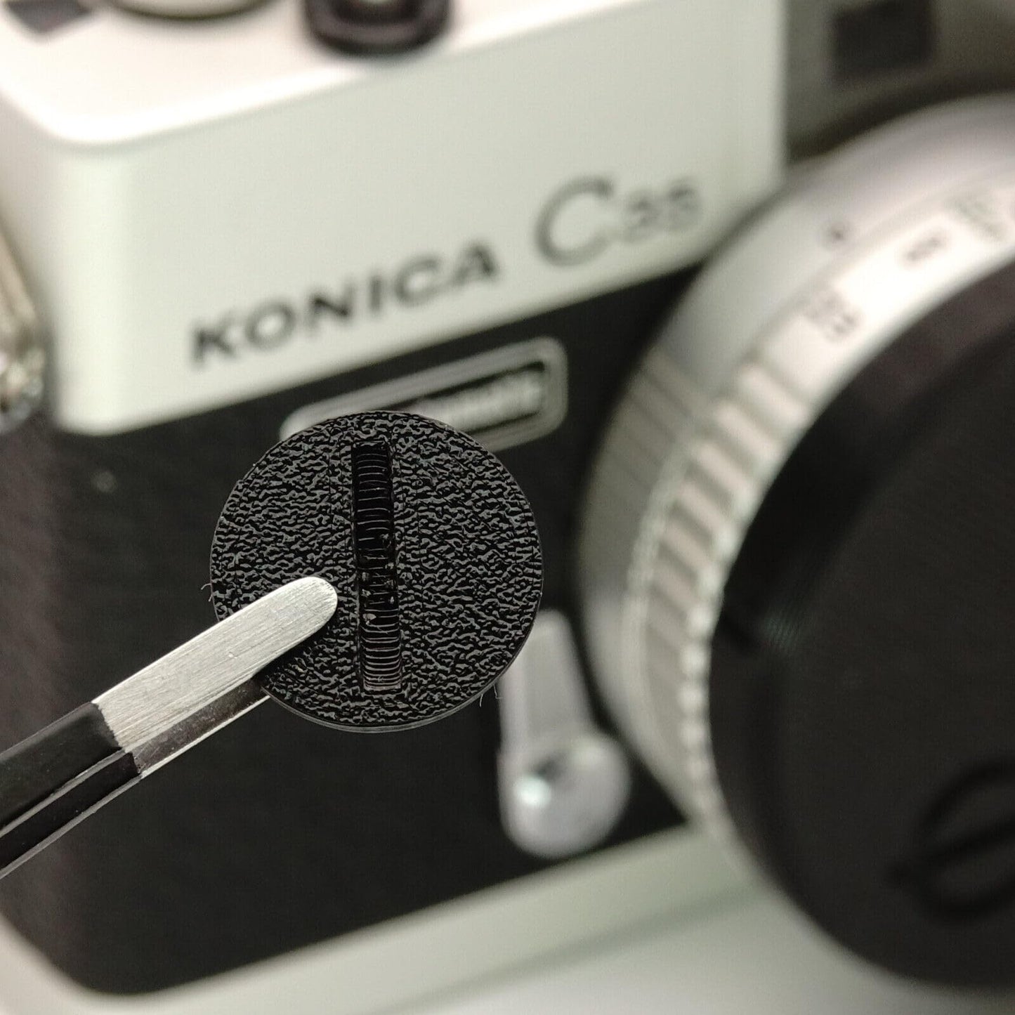 Battery compartment cover for Konica C35