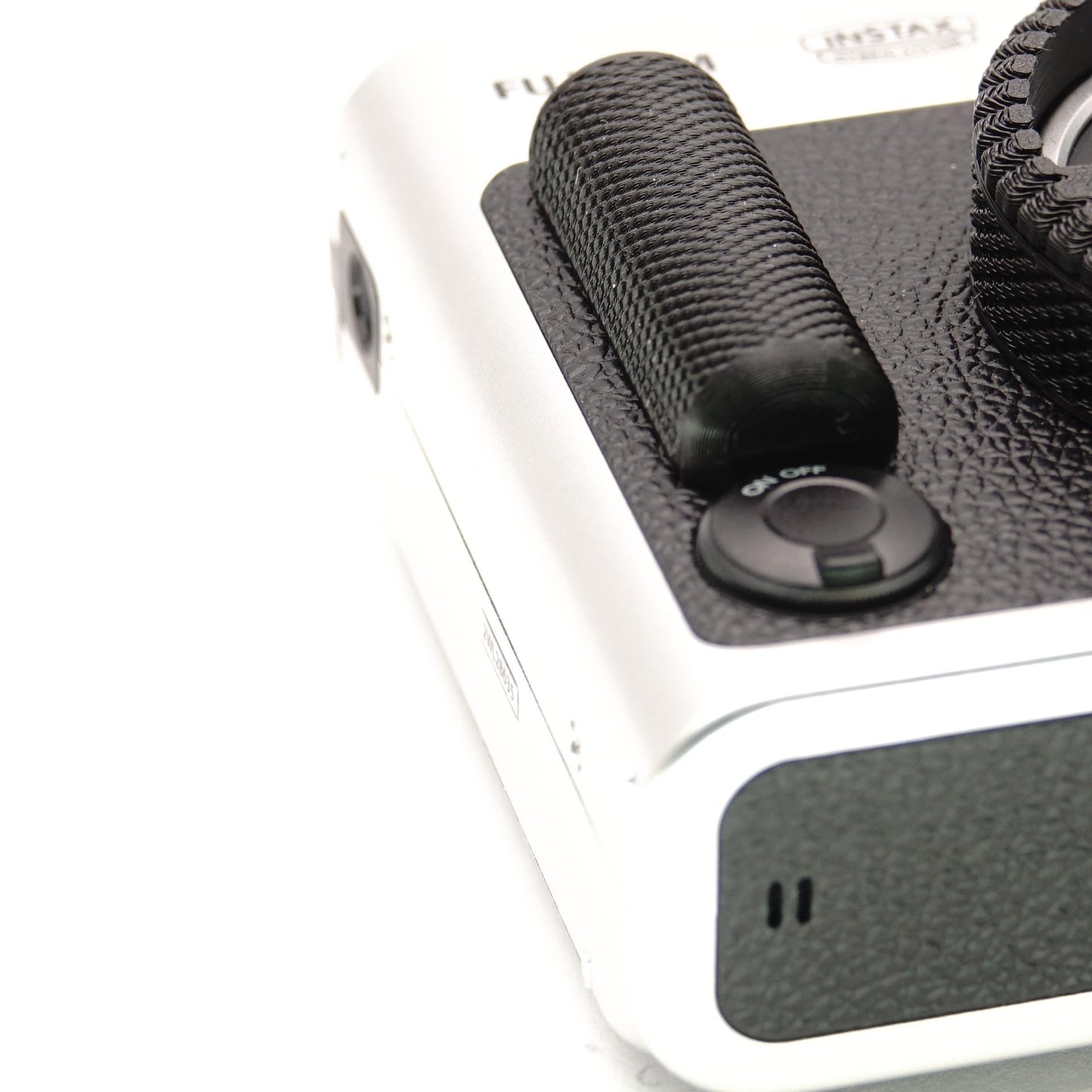 Impugnatura (autoadesiva) per Minox 35 e Fuji Instax Mini Evo