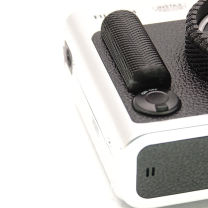 Impugnatura (autoadesiva) per Minox 35 e Fuji Instax Mini Evo