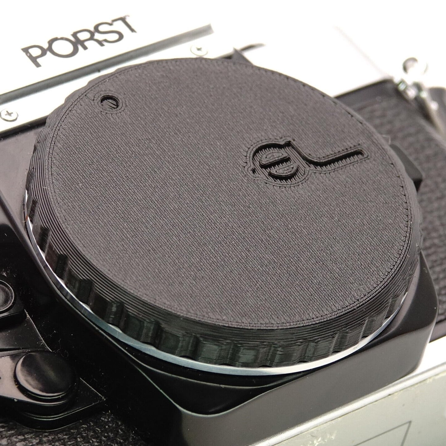 Copriobiettivo per Fujica AX-1, AX-3, AX-5 e Porst CR